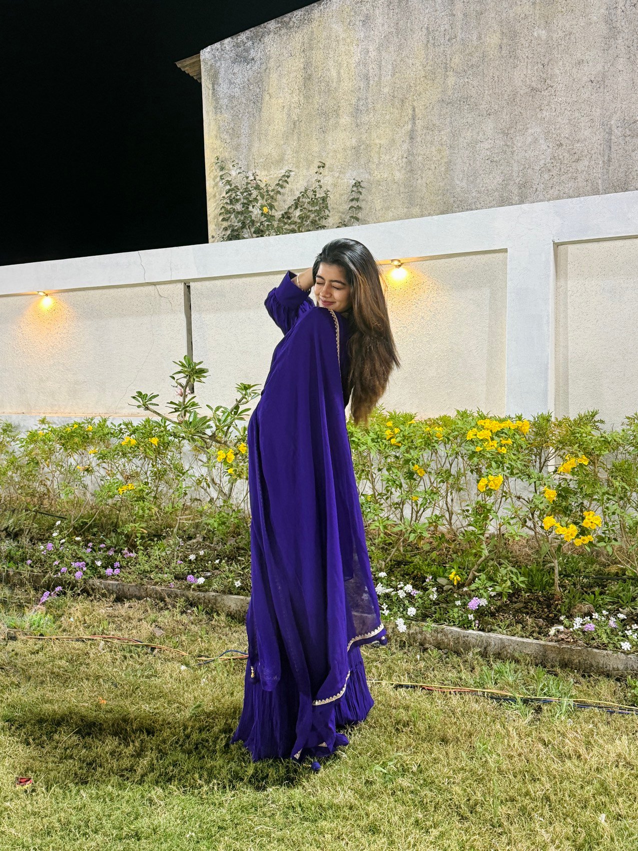 Terrace garden shoot in a cobalt blue flowing set